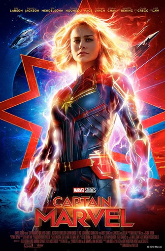 Captain Marvel standing tall with a background of a spaceship on one side and a fighter jet on the other side.
