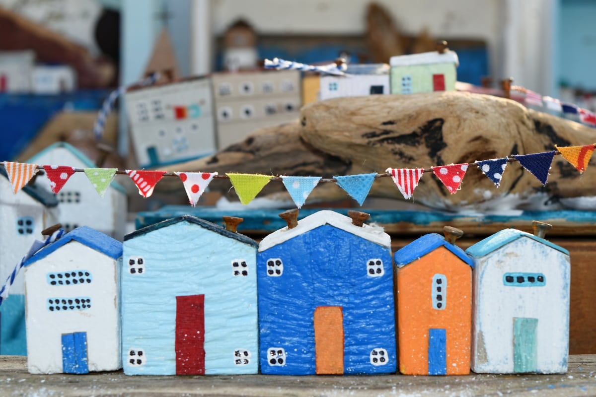 Image of a row of small houses made out of cardboard