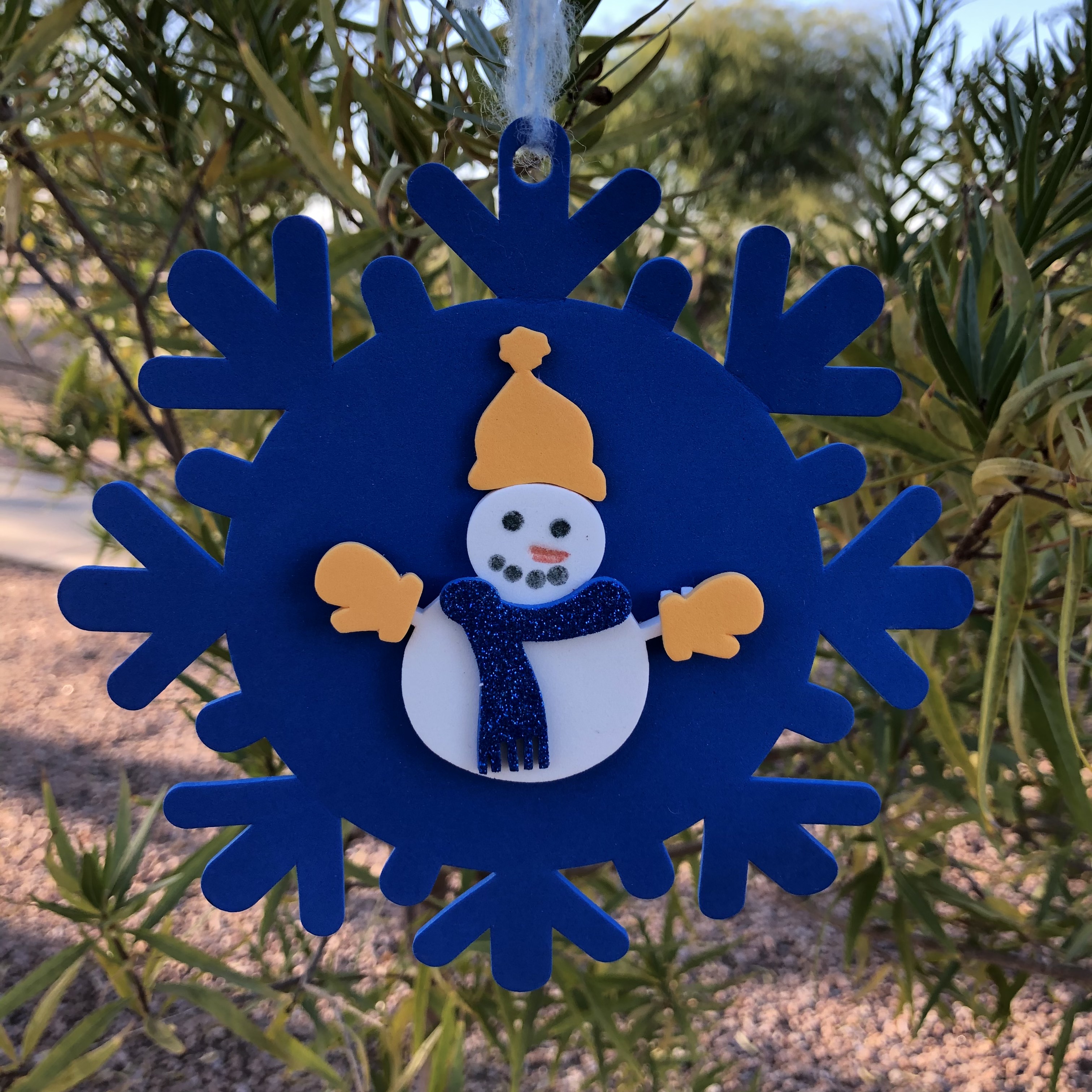 Snowman on snowflake ornament