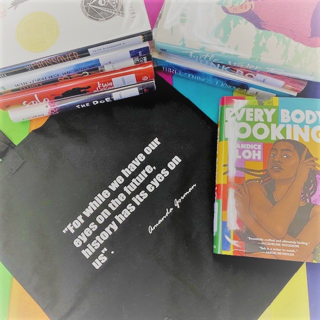YA books with a black canvas bag and a quote from Amanda Gorman