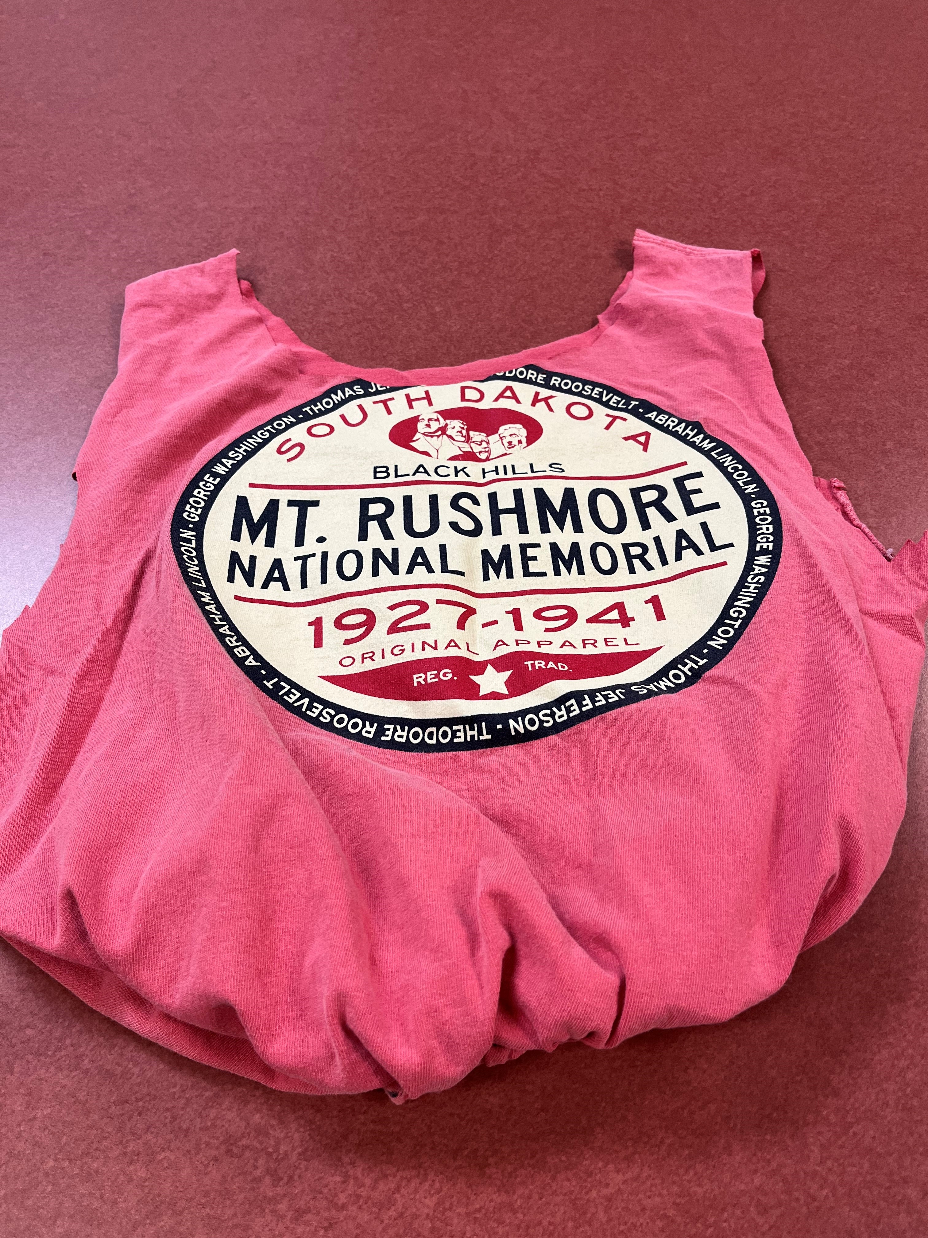 picture of t-shirt tote made out of a pink Mount Rushmore shirt