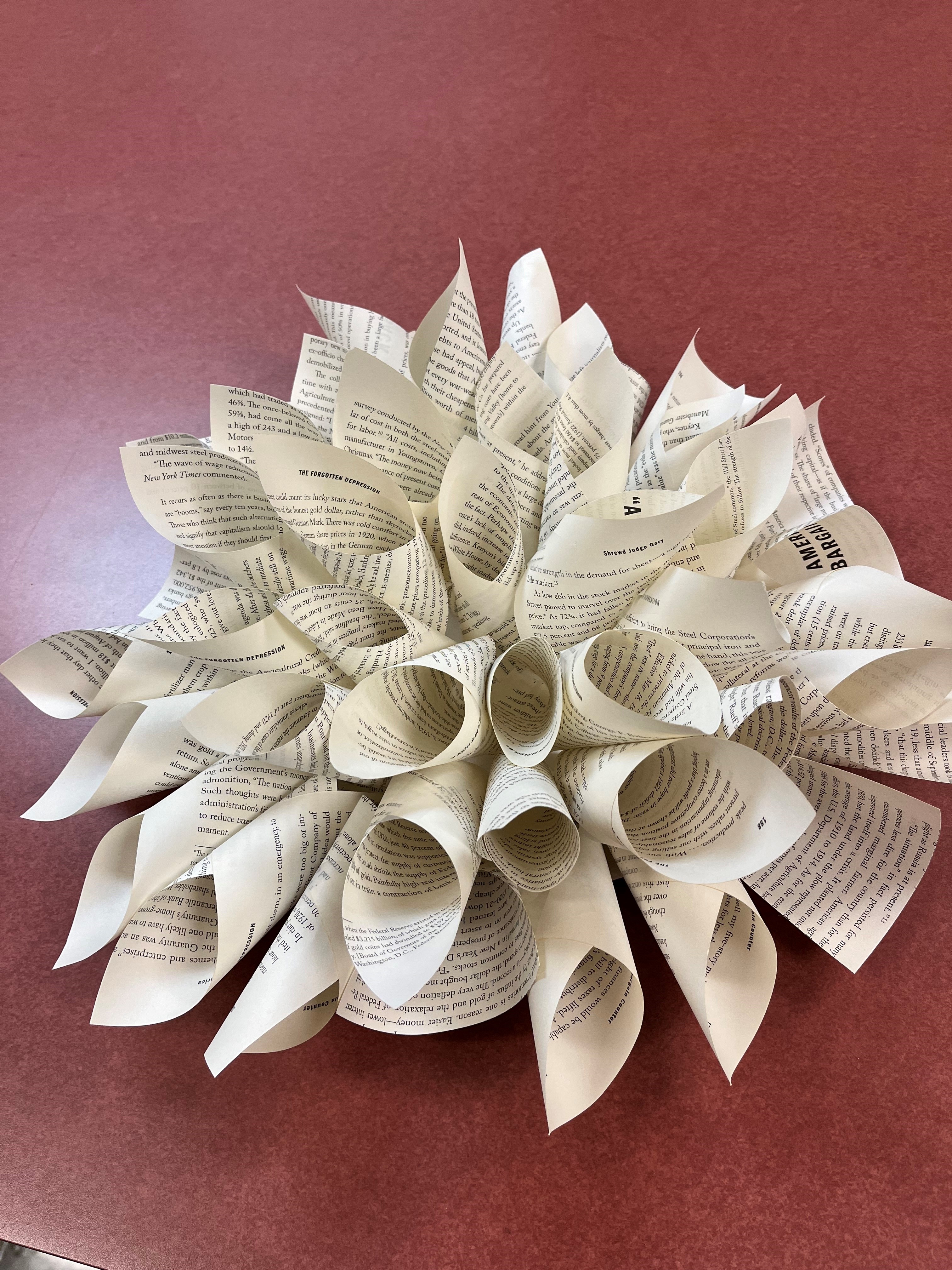 a flower made out of book pages