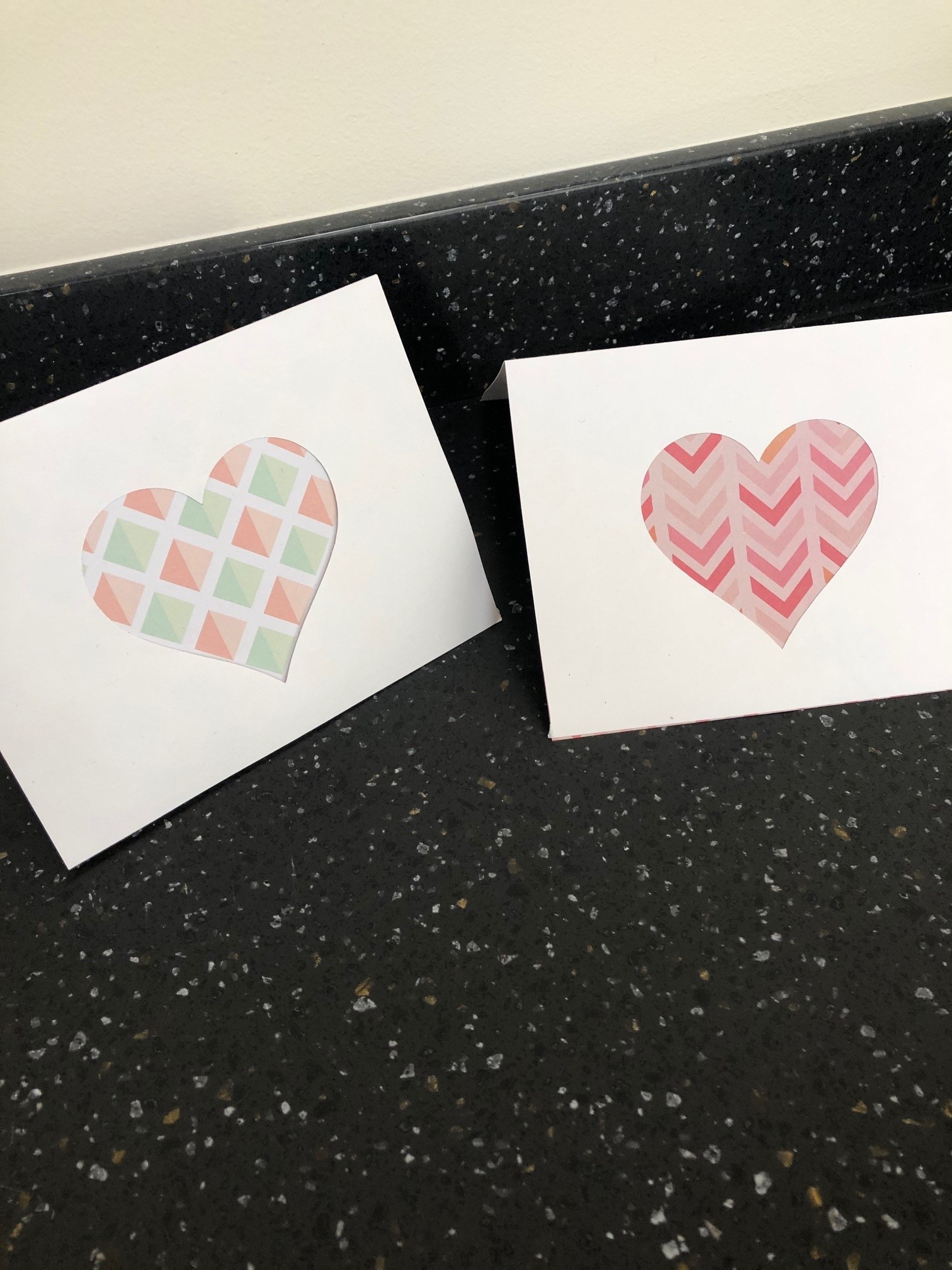 cards with colored cut-out hearts on front