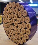 wine corkboard with purple ribbon