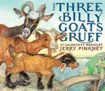 Small, Medium, and large brown Billy goats standing on a rock looking at the bridge that connects to a green piece of land