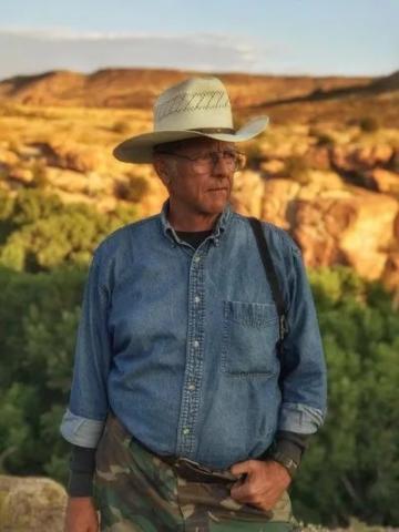 Author Dan Baldwin looking out into the desert.