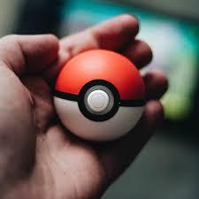 Pokéball in a hand