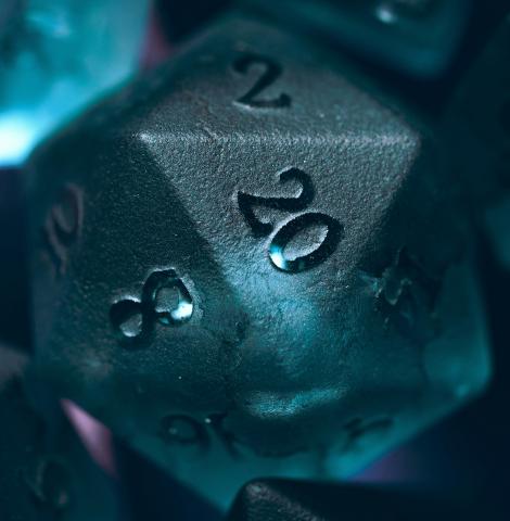 Blue dice pointing 20-side up.