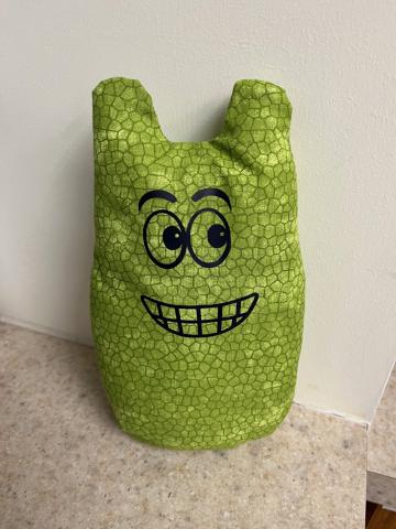 green stuffed soft monster