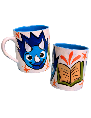 As You Wish mugs with blue painted dinosaur and a yellow and green book.