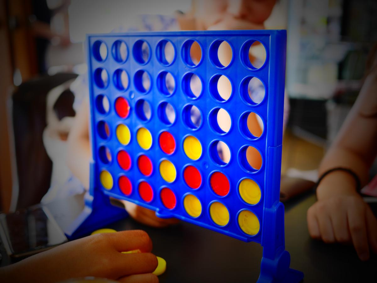 People playing connect four