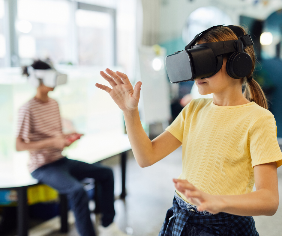 Teens playing VR headsets