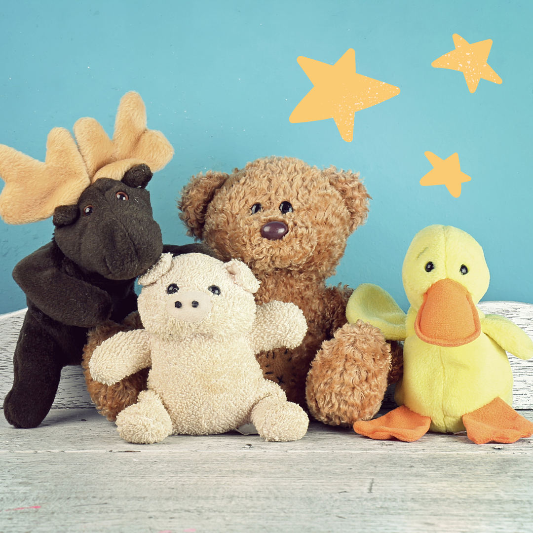 A group of four stuffed animals 