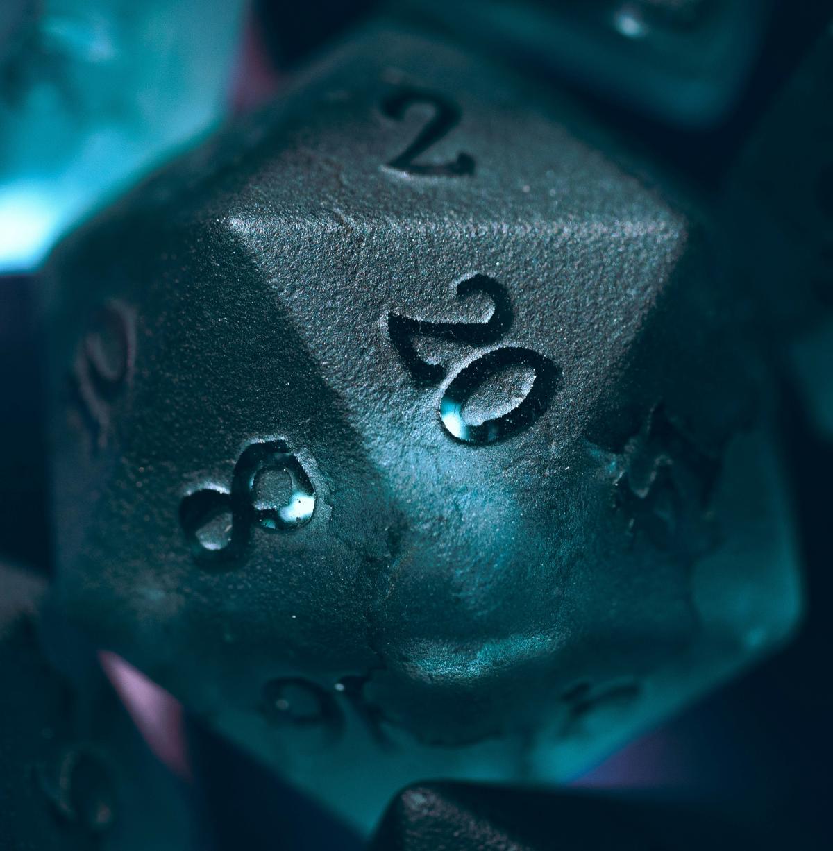 Blue dice pointing 20-side up.