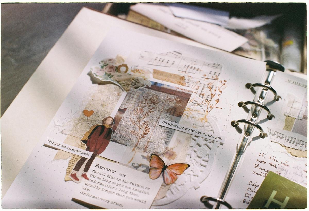 journal page covered with cut out pictures, photos and written text